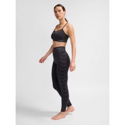 Damski biustonosz sportowy Hummel CI Scrunch. Czarne biustonosze sportowe Hummel, bez wzorów, na fitness i siłownię. Za 152.50 zł.