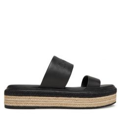 Espadryle Calvin Klein. Czarne espadryle Calvin Klein, bez wzorów, bez obcasa. Za 409.99 zł.