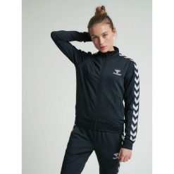 Damska kurtka zapinana na zamek Hummel hmlnelly 2.0. Czarne kurtki Hummel, na wiosnę, l, bez wzorów, z materiału, klasyczne, bez kaptura. Za 138.00 zł.