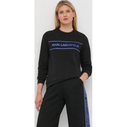 Karl Lagerfeld bluza damska kolor czarny z nadrukiem. Czarne bluzy KARL LAGERFELD, m, z aplikacjami, z materiału, bez ramiączek, bez kaptura. W wyprzedaży za 559.99 zł.