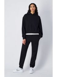 Champion Spodnie dresowe w kolorze czarnym rozmiar: XL. Czarne spodnie dresowe Champion, bez wzorów, z dresówki. Za 134.45 zł.