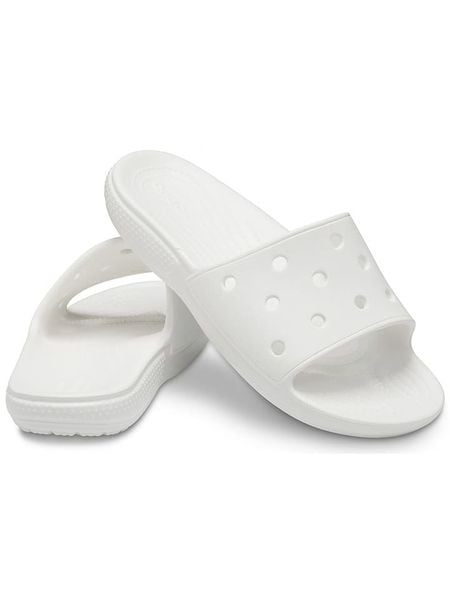 Crocs Klapki "Classic" w kolorze białym rozmiar: 38/39. Białe klapki Crocs, bez wzorów, klasyczne, z otwartym noskiem, bez obcasa, bez zapięcia. Za 74.46 zł.