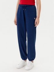 Guess Spodnie dresowe W5YB65 KCXQ1 Granatowy Regular Fit. Niebieskie spodnie dresowe Guess, z aplikacjami, z bawełny. Za 389.99 zł.
