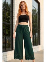 SOULSHAE Spodnie w kolorze zielonym rozmiar: L/XL. Zielone spodnie materiałowe SOULSHAE, bez wzorów, z materiału, z podwyższonym stanem. Za 124.95 zł.