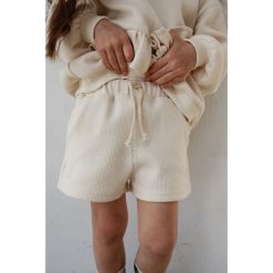 MINI spodenki dresowe z dzianiny waflowej w kolorze BRIGHT BEIGE - JELLY. Brązowe szorty sportowe Marsala, bez wzorów, z bawełny. Za 119.90 zł.