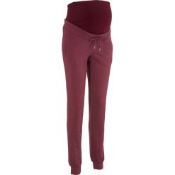 Spodnie ciążowe sportowe bonprix czerwony klonowy. Spodnie dresowe marki bonprix. Za 109.99 zł.
