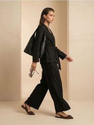 Żakiet kimono z wiskozą i domieszką lnu - czarny. Czarne marynarki i żakiety Sinsay, l, bez wzorów, z wiskozy, bez ramiączek. Za 69.99 zł.