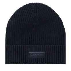 Czapka Calvin Klein. Niebieskie czapki zimowe Calvin Klein, bez wzorów. Za 169.99 zł.