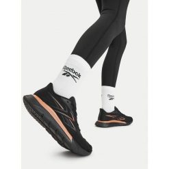 Buty na siłownię Reebok. Czarne buty treningowe Reebok, bez wzorów, bez zapięcia, na fitness i siłownię. Za 399.99 zł.