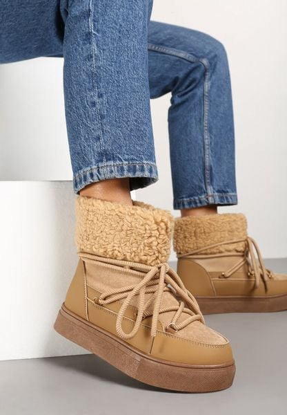 Brązowe Śniegowce Futerkowe na Platformie ze Sznurowaną Cholewką Izalithia. Brązowe śniegowce Renee, bez wzorów, z futra, bez zapięcia. Za 89.99 zł.