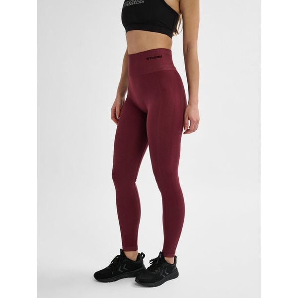 Damskie legginsy bezszwowe Hummel. Brązowe legginsy Hummel, bez wzorów, z materiału, sportowe. Za 163.50 zł.