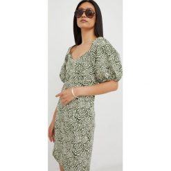 Gestuz sukienka kolor zielony mini dopasowana. Zielone sukienki Gestuz, bez wzorów, z dzianiny, bez kołnierzyka, bez ramiączek, mini, dopasowane. Za 649.99 zł.