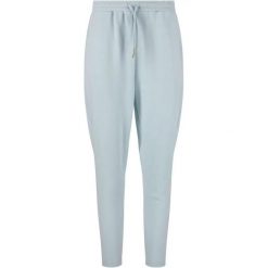 Damskie spodnie dresowe Athlecia Jacey V2. Czerwone spodnie dresowe Athlecia, bez wzorów, z dresówki. Za 249.00 zł.