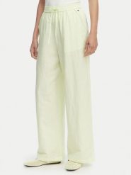 Tommy Jeans Spodnie materiałowe DW0DW22285 Zielony jasny Loose Fit. Zielone spodnie materiałowe Tommy Jeans, bez wzorów, z jeansu. Za 409.99 zł.