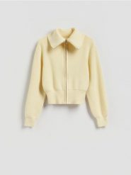 Kardigan z zapięciem na zamek - jasnożółty. Żółte swetry Reserved, l, bez wzorów, z dzianiny, bez ramiączek. Za 139.99 zł.