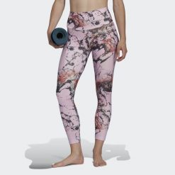 Damskie legginsy z nadrukiem do jogi adidas Essentials. Białe legginsy adidas, bez wzorów, sportowe. W wyprzedaży za 180.60 zł.