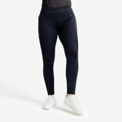 Legginsy jeździeckie damskie ciepłe z silikonowym lejem. Czarne legginsy FOUGANZA, bez wzorów, z materiału, długie. Za 199.99 zł.