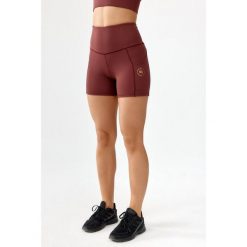 Spodenki szorty damskie treningowe fitness Rough Radical Hamptons Shorts. Brązowe szorty sportowe ROUGH RADICAL, bez wzorów, na fitness i siłownię. W wyprzedaży za 110.41 zł.