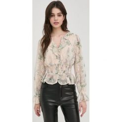 Guess koszula damska kolor beżowy. Brązowe koszule Guess, l, z aplikacjami, z tkaniny, bez kołnierzyka, bez ramiączek. Za 519.99 zł.