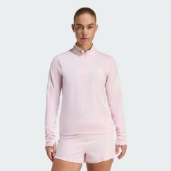 Bluza adi365 Iconic Running 1/2 Zip. Czerwone bluzy adidas, bez wzorów, sportowe, bez ramiączek, bez kaptura. Za 219.00 zł.