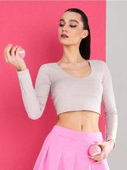 Bluzka sportowa Gym Hard - kremowy. Białe t-shirty sportowe Sinsay, l, bez wzorów, bez ramiączek. Za 29.99 zł.