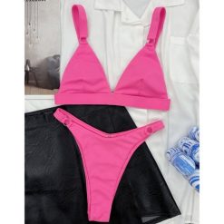 Strój kąpielowy z kółeczkami i regulowanymi ramiączkami na plażę i basen Shouko. Niebieskie stroje jednoczęściowe Intica, bez wzorów, wakacyjne. Za 129.00 zł.