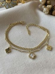 Luseera Pozłacana bransoletka z elementami ozdobnymi rozmiar: onesize. Białe bransoletki Luseera, z perłą, pozłacane. Za 43.99 zł.