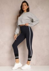 Granatowe Legginsy z Lampasami i Ściągaczem z Napisem Bime. Niebieskie legginsy Renee, bez wzorów, z materiału. W wyprzedaży za 41.99 zł.