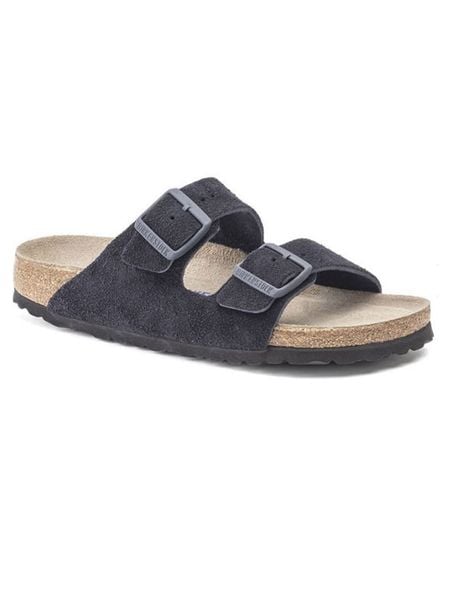 Birkenstock Skórzane klapki "Arizona" w kolorze granatowym rozmiar: 41. Niebieskie klapki Birkenstock, bez wzorów, ze skóry, klasyczne, z otwartym noskiem, bez obcasa, bez zapięcia. Za 411.91 zł.