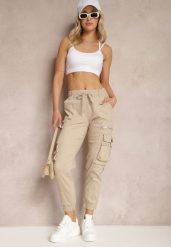 Beżowe Bawełniane Spodnie Bojówki z Gumką w Talii i Kieszeniami Zolarae. Brązowe jeansy Renee, bez wzorów, z bawełny, eleganckie. W wyprzedaży za 44.99 zł.