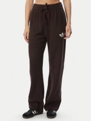 Adidas Spodnie dresowe Essentials IA4437 Brązowy Loose Fit. Brązowe spodnie dresowe adidas, bez wzorów, z bawełny. Za 298.99 zł.