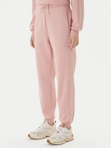 Guess Spodnie dresowe V5BB23 KCX22 Różowy Regular Fit. Czerwone spodnie dresowe Guess, z aplikacjami, z dresówki. Za 479.99 zł.