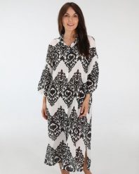 Luźna sukienka z bawełny. Sukienki Unisono, l, bez wzorów, z bawełny, klasyczne, bez kołnierzyka, bez ramiączek, midi. Za 179.00 zł.