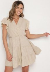 Beżowa Kopertowa Sukienka Ozdobiona Falbanami i Paskiem Liliessa. Brązowe sukienki Born2be, na co dzień, s, bez wzorów, eleganckie, bez kołnierzyka, bez ramiączek, mini, kopertowe. W wyprzedaży za 72.24 zł.