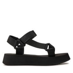 Sandały Calvin Klein Jeans. Czarne sandały Calvin Klein Jeans, bez wzorów, z jeansu, bez obcasa, na płaskiej podeszwie, bez zapięcia. Za 419.99 zł.