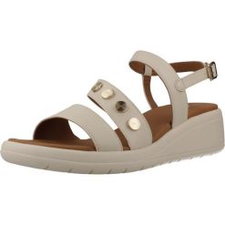 Sandały GEOX D MELICONIA Beżowy. Brązowe sandały Geox, bez wzorów, z syntetyku, sportowe, bez obcasa, bez zapięcia. Za 359.99 zł.