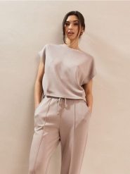 Bluza bez rękawów soft touch z dodatkiem wiskozy - kremowy. Białe bluzy bez kaptura Sinsay, l, bez wzorów, z dzianiny, bez kaptura. Za 39.99 zł.