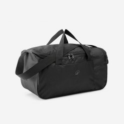 Torba sportowa Kipsta Essential 20 l. Czarne torby sportowe Decathlon, bez wzorów, z materiału, na ramię. Za 34.99 zł.