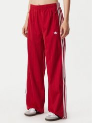 Adidas Spodnie dresowe Pinstripe Firebird Loose Trackpant KS9977 Czerwony Wide Leg. Czerwone spodnie dresowe adidas, bez wzorów, z dresówki. Za 299.99 zł.