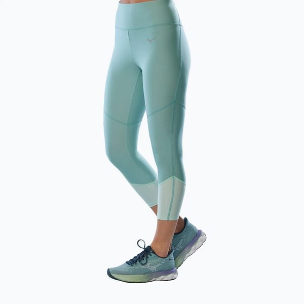 Legginsy damskie Mizuno Impulse Core 3/4. Niebieskie legginsy Mizuno, bez wzorów, z elastanu. Za 119.99 zł.