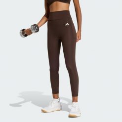 Legginsy 7/8 bez szwu z przodu Optime Essentials. Brązowe legginsy adidas, bez wzorów, sportowe. Za 219.00 zł.