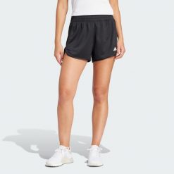 Szorty Pacer Essentials Knit High-Rise. Czarne szorty sportowe adidas, bez wzorów, z materiału, na fitness i siłownię. Za 139.00 zł.