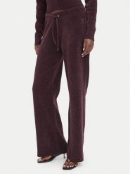Juicy Couture Spodnie dresowe JCWEB006 Czarny Regular Fit. Czarne spodnie dresowe Juicy Couture, bez wzorów, z dresówki. Za 549.99 zł.