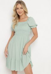 Zielona Sukienka z Bawełny z Elastycznym Dekoltem i Falbanką Loridia. Zielone sukienki Born2be, na co dzień, m, bez wzorów, z bawełny, eleganckie, bez kołnierzyka, bez ramiączek, mini. W wyprzedaży za 38.24 zł.