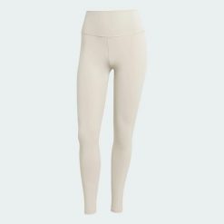 Legginsy All Me 7/8. Brązowe legginsy adidas, bez wzorów, z elastanu. Za 279.00 zł.