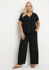Czarny Komplet o Fasonie Oversize Bluzka i Szerokie Spodnie Amisora. Czarne bluzki Born2be, uniwersalny, bez wzorów, bez kołnierzyka, bez ramiączek. Za 119.99 zł.