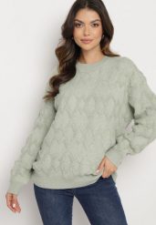 Miętowy Sweter o Luźnym Kroju i Wzorzystym Splocie ze Ściągaczami Elondrae. Zielone swetry Born2be, uniwersalny, bez wzorów, z bawełny, eleganckie, bez ramiączek. W wyprzedaży za 135.99 zł.