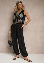 Czarne Spodnie Joggery High Waist ze Ściągaczami Korilanea. Czarne jeansy Renee, l, bez wzorów, z jeansu, eleganckie, z podwyższonym stanem. W wyprzedaży za 39.99 zł.