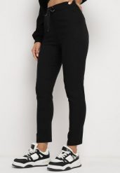 Czarne Spodnie z Dodatkiem Bawełny Wysokim Stanem i Gumką w Pasie Ozdobione Napisami Rilella. Czarne jeansy Born2be, l, bez wzorów, z bawełny, biznesowe, z podwyższonym stanem. Za 39.99 zł.