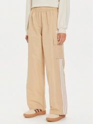 Adidas Spodnie dresowe adicolor 3-Stripes IZ0717 Beżowy Loose Fit. Brązowe spodnie dresowe adidas, bez wzorów, z dresówki. Za 239.99 zł.